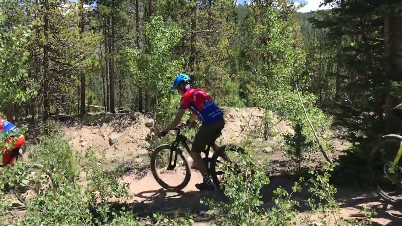 Riders descending Winter Park singletrack
